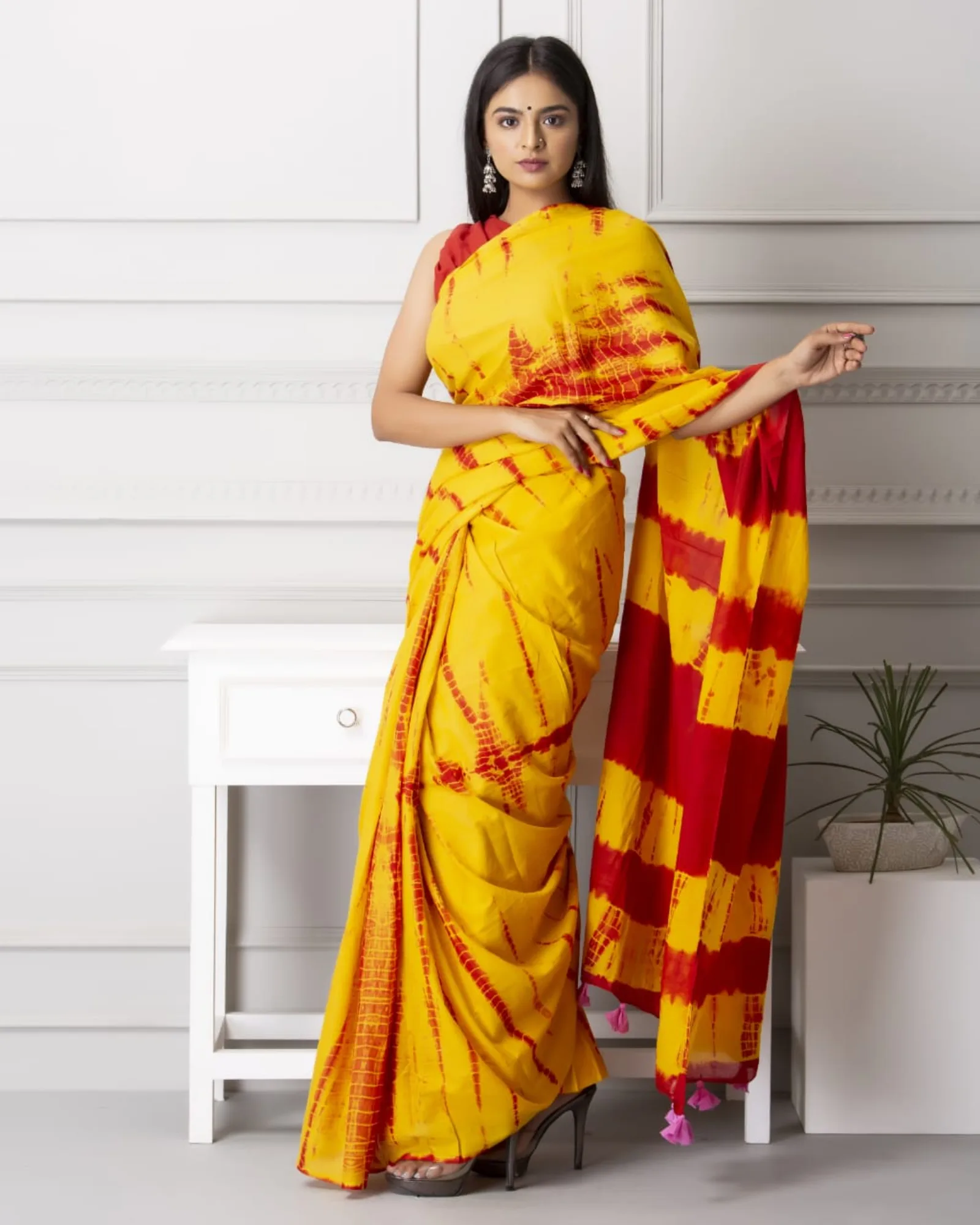 A mulmul cotton saree, showing the fabric's light, semi-sheer weave