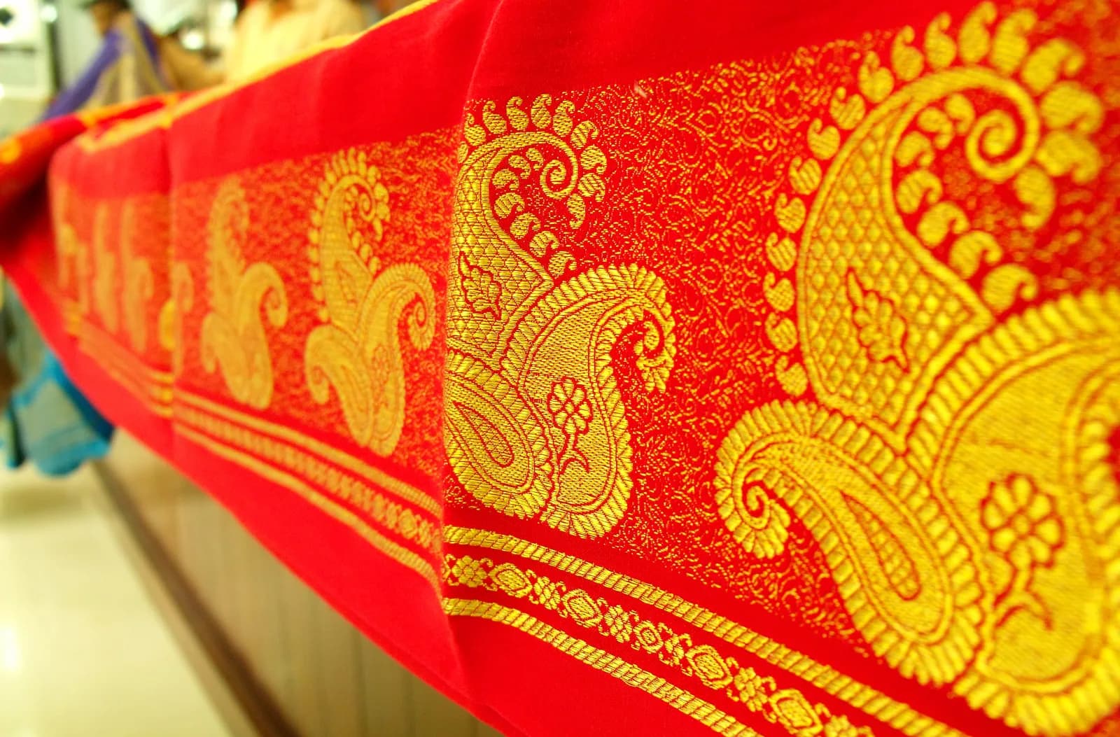 A Mysore silk saree with a plain glossy body and a contrast zari border