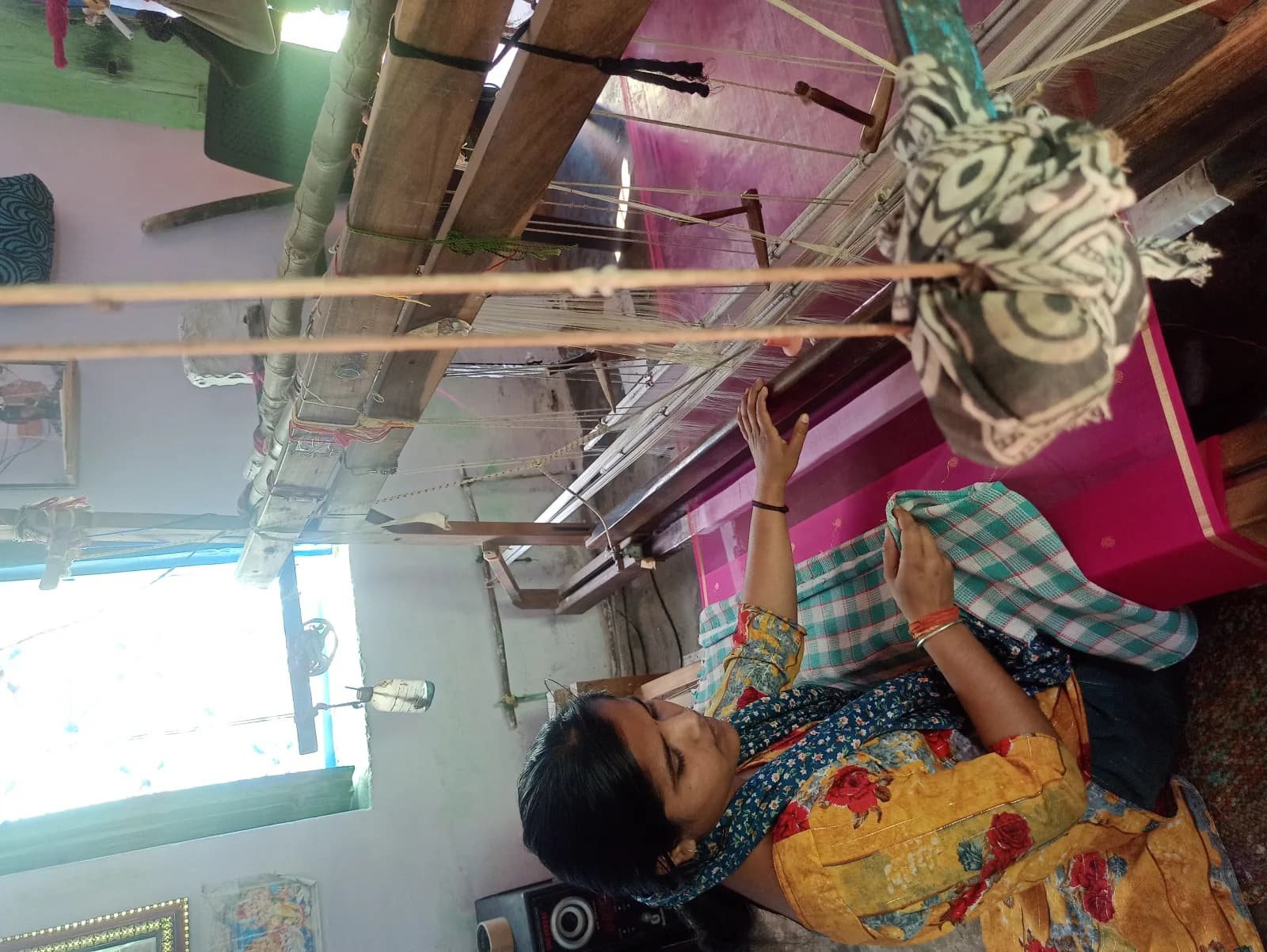 A weaver making a handloom saree in Pranpur village near Chanderi